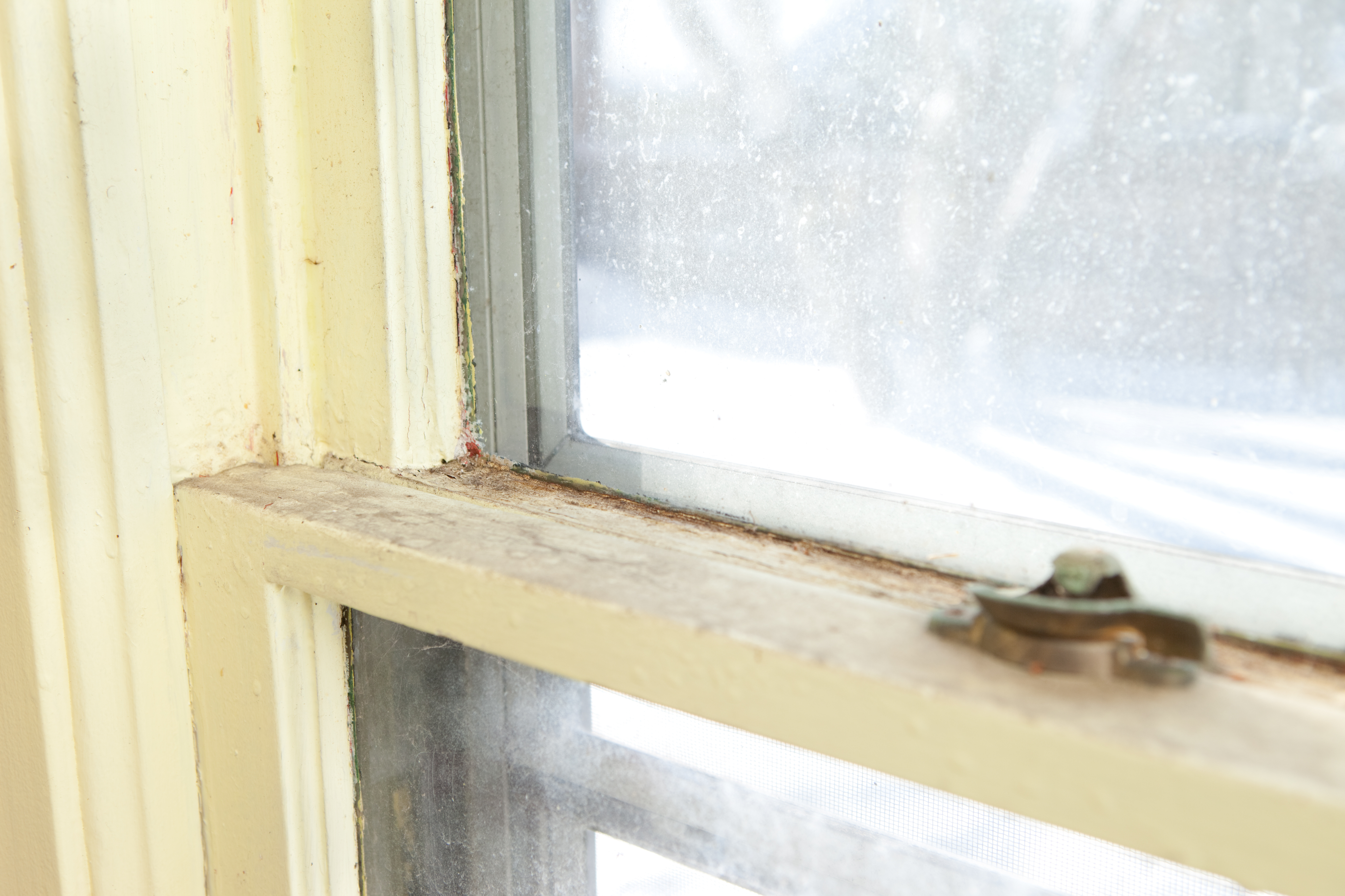 window with peeling paint